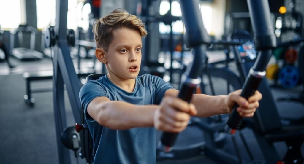 A young boy in the gym